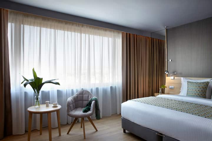 Guest room at the Wyndham Grand Athens in Athens, Other than US/Canada